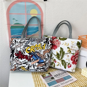 Large capacity canvas tote bag with stylish cartoon and floral prints for daily shopping