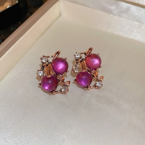 Vintage-Ohrringe mit lila Kugeln, silberner Nadel und Roségold-Finish im Schlangen-Design