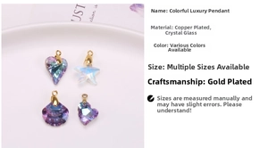 Macro shot of colorful crystal glass heart and starfish pendants with gold plated copper