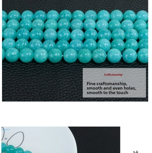 Macro detail of natural amazonite loose round beads with polished blue-green texture
