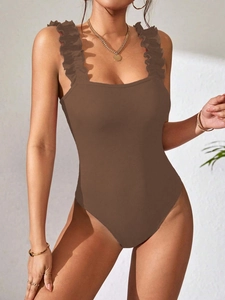 Detail of ribbed knit bodysuit in brown with elegant ruffle shoulder straps for women