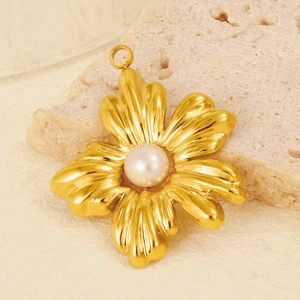 Macro shot of 304 stainless steel flower pendant with a white natural pearl detail