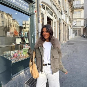 Chic women's grey short jacket with faux fur collar and white high waist trousers