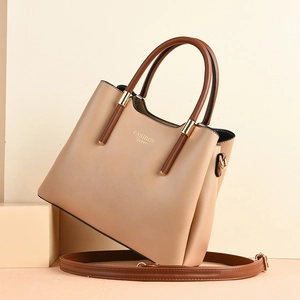 Chic beige and brown PU leather handbag with Fashion Queen print and gold hardware