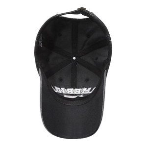 Internal view of black cotton baseball cap showing stitching and adjustable metal buckle