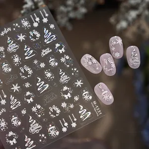 Christmas nail stickers with 3D white embossed snowflakes and festive tree designs