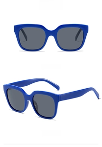 Front and 45-degree side view of large square blue frame sunglasses with grey lenses
