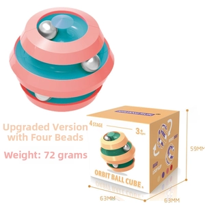 Pink and blue orbit ball cube puzzle with four metal beads and retail packaging box