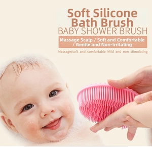 Macro detail of pink silicone baby bath brush with soft bristles for gentle scalp massage