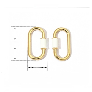 Detail of oval spring clasps in stainless steel and gold enamel with 22mm x 12mm size