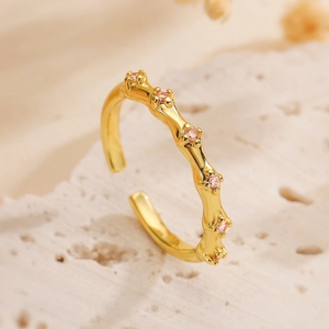 Minimalist 18K gold plated adjustable ring with bamboo texture and pink zircons
