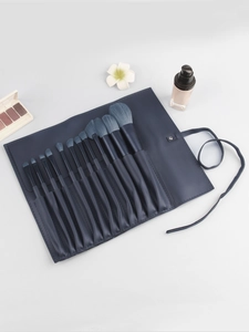 Detailed 12pcs makeup brush set with gradient blue bristles and leather storage wrap