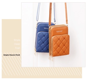 Vertical quilted phone crossbody bags in navy blue and orange with three zipper pockets