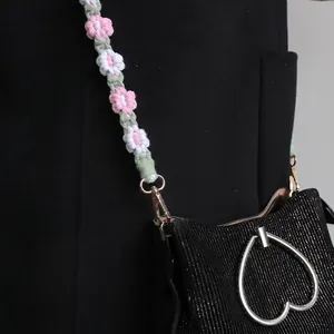 Black glitter handbag with handmade pink and white crochet floral strap and heart zipper