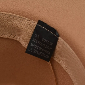 Detail view of the interior tag showing 65% cotton and 35% polyester material blend