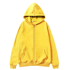 Detail of a bright lemon yellow zip-up hoodie featuring a fleece lining and smooth metal zipper