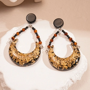 Retro resin crescent drop earrings with gold foil and amber beads in vintage style