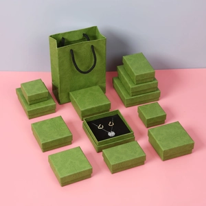 Vintage green jewelry gift box set with damask pattern including bags and various sizes