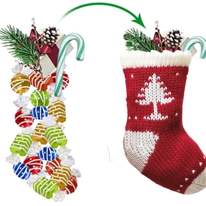 Knitted Christmas stockings in red and white with tree patterns for holiday home decor
