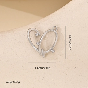 Detail of silver heart pendant with zircons showing dimensions of 1.8cm by 1.6cm