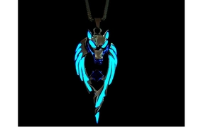 Luminous wolf head pendant with wings and blue glowing gemstone in the dark