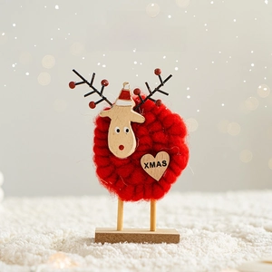 Handcrafted Christmas reindeer tabletop ornament with red wool yarn and wooden base decor