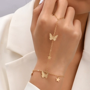 Gold star and butterfly sequin ring bracelet chain jewelry set for women on model