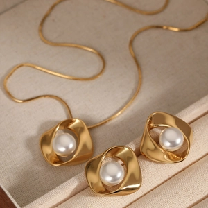 Elegant 316 stainless steel jewelry set with irregular gold rings and white pearls