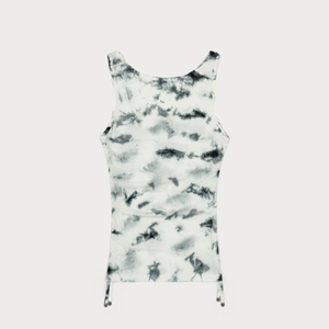 Detail of tie-dye sports tank top with ribbed texture, drawstring hem, and bead accents