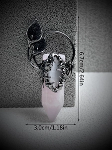 Detail view of pink crystal pendant with silver leaf decor, size 6.7cm by 3.0cm