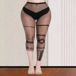 Women's black Halloween patterned fishnet tights with intricate geometric lace designs