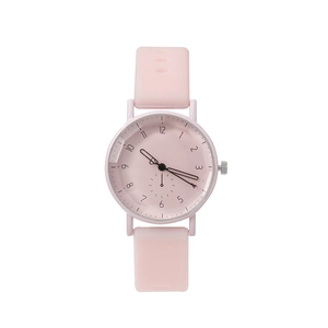 Pink minimalist quartz wristwatch for women with silicone strap and round analog dial