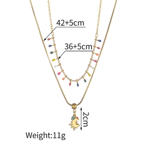 Detailed view of golden double-layer necklace with star moon charms and size dimensions