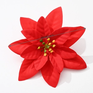 Close-up of 13cm red velvet artificial poinsettia flower for Christmas tree decoration