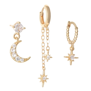 Three-piece set of golden moon and star earrings with sparkling zirconia stones
