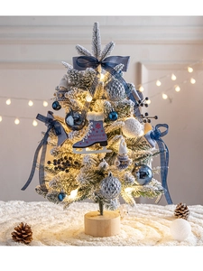 Blue theme mini flocked Christmas tree with ornaments, ice skates and warm LED lights