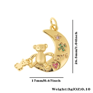 Detail showing bear on moon pendant with LOVE engraving and colorful gemstones