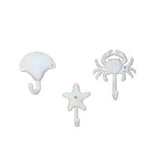 Wandhaken-Set im Meeres-Design aus Gusseisen mit Muschel Seestern und Krabbe in Cremeweiß