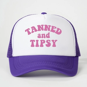 Detail of purple and white mesh trucker hat with pink TANNED and TIPSY print