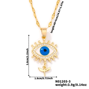 Macro view of blue evil eye necklace pendant with size specifications and white crystals