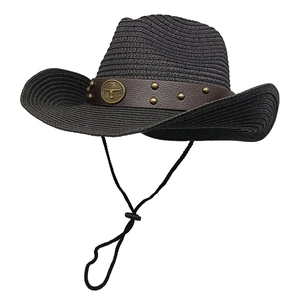 Detail of black woven cowboy straw hat with vintage rivets and adjustable chin strap