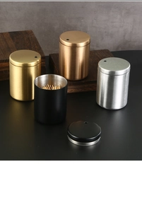 Cylindrical stainless steel toothpick holders in gold, silver and black brushed finish