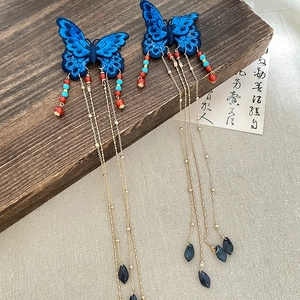 Barrettes à cheveux ethniques avec papillon brodé bleu et glands en perles