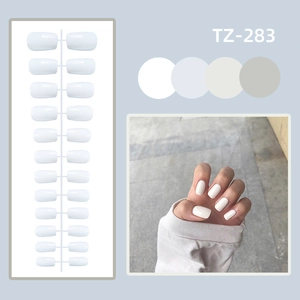 Glossy white medium long square press-on nails set with 24 pieces and model display