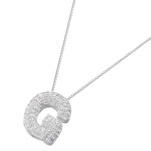 Macro shot of silver-tone letter G pendant with pavé cubic zirconia on a box chain