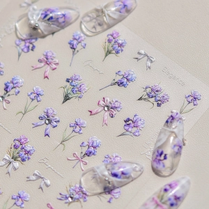 Elegant purple iris flower nail art stickers with 3D crystal accents and ribbon designs