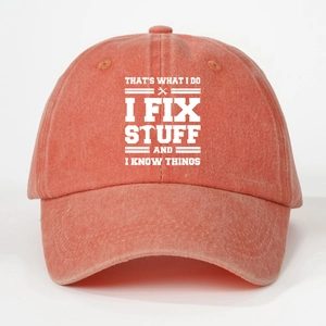 Detail of washed cotton baseball cap with white printed lettering and tool graphics