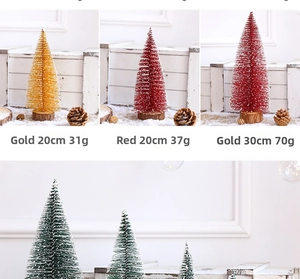 Close-up of mini bottle brush Christmas trees with faux snow and natural wood base