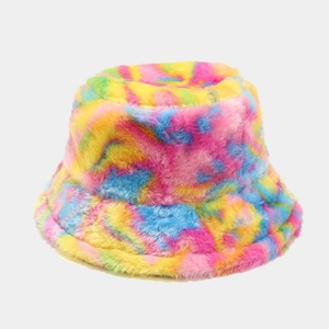 Detail showing the rainbow tie-dye pattern and soft faux fur texture of the warm bucket hat