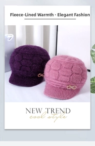 Close-up of thick knit winter hats with fleece lining and elegant metal bow details